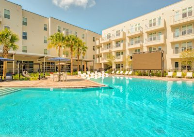 outdoor pool at liv+ gainesville's student apartments