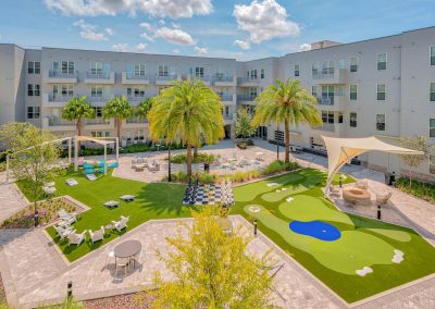 outdoor activity lounge at liv+ gainesville's student apartments